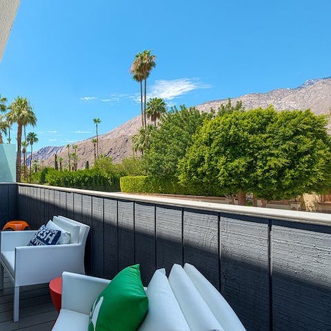 Watch the sunset over the mountain from your balcony