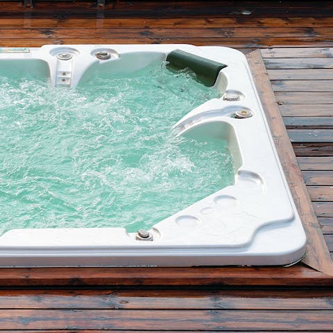 Relax in the outdoor jacuzzi hot tub after a day of exploring the island of Mykonos