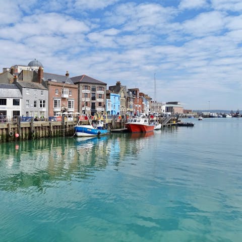 Stroll to Weymouth's historic harbour for an ice cream