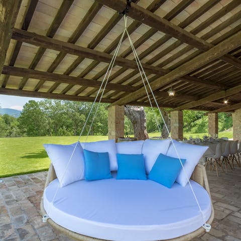 Spend afternoons reading in the hammock chair