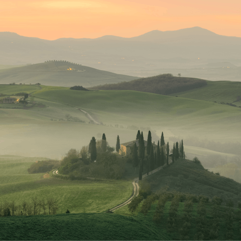 Stay in this restored water mill and explore the picturesque towns of Tuscany