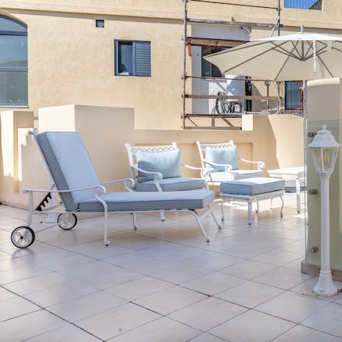 Relax with a glass of Israeli wine on your private balcony