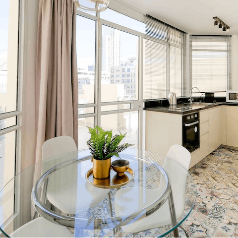 Sit down to a slap-up supper in the bright kitchen-diner