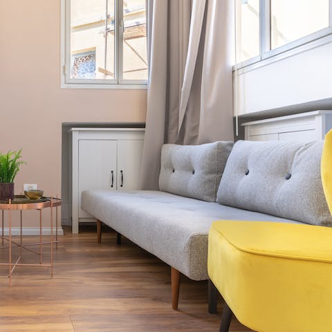 Recline in the light-filled living space after a hearty home-cooked breakfast