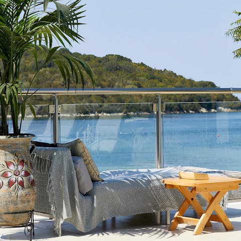 Flop down with a cool drink and a good book on the terrace