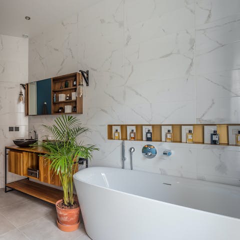 Soak travel-weary legs in the luxury freestanding tub