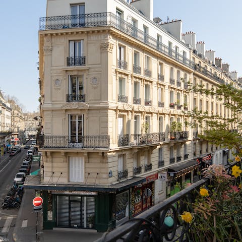 Perch on your Juliet balcony, watching the locals go about their day below