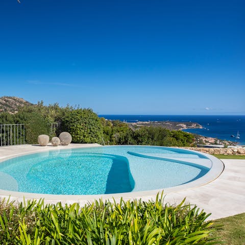 Admire sea views as you swim in the private pool