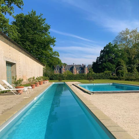 Take the plunge into the home’s outdoor pools
