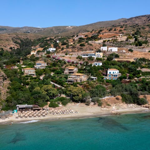 Savour being just a few steps from the sandy beach