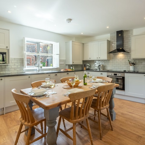 Lay the table for a family feast in the made-for-action kitchen area