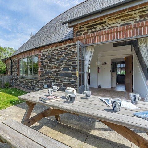 Drink in morning sunshine and cuppas from the private terrace