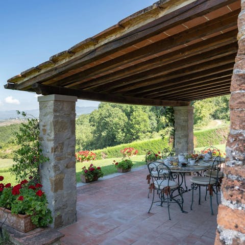 Soak up the rolling Tuscan hillsides over an alfresco lunch