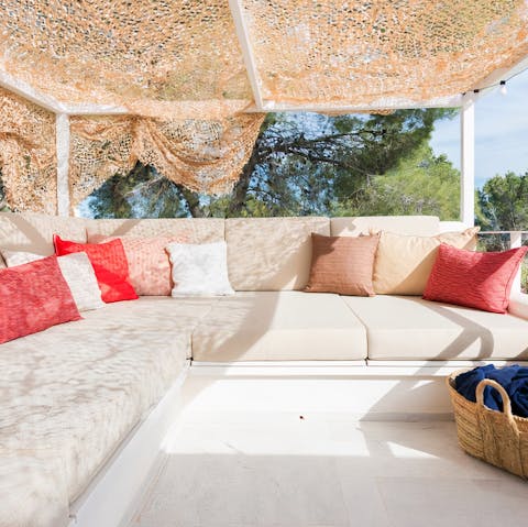 Pour a glass of wine and enjoy reading in the fresh air