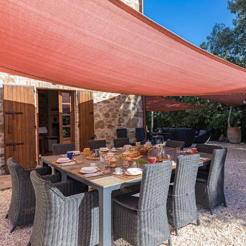 Gather in the outdoor dining area for an alfresco feast with your family
