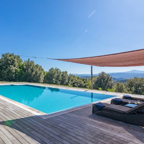Stretch out in the private pool overlooking the beautiful view
