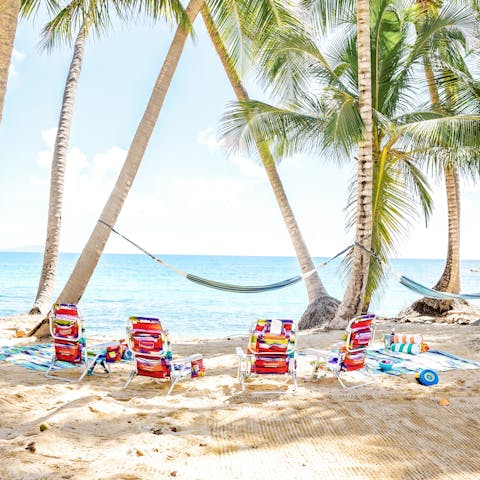 Stay steps from the sand in Palmas Del Mar