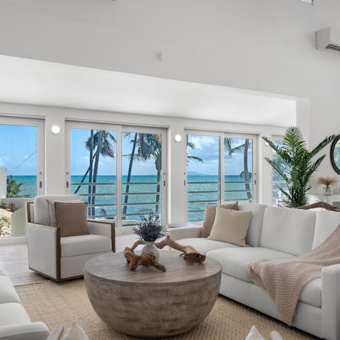 Unwind in the airy living space with picture-perfect sea views