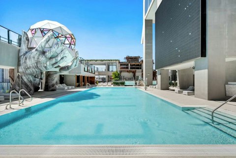 Head up to the rooftop pool to relax after a busy day