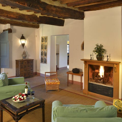 Relax in the sitting room that oozes with traditional Tuscan charm