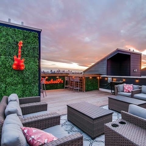 Spread out across two rooftop decks with Downtown views