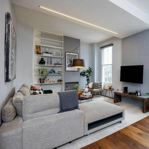Unwind amid curious objets d'art and houseplants in this tranquil home