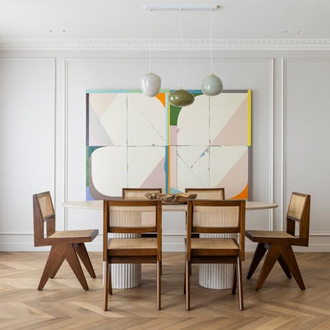 Gather around the stylish dining table for a group meal