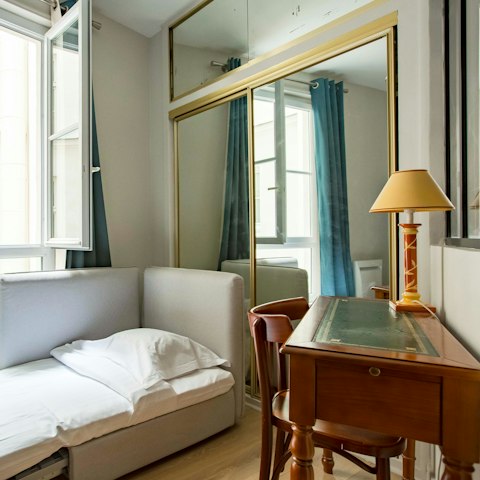 Catch up on emails in the study that doubles as a bedroom