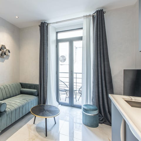 Enjoy cosy evenings of movies on the comfy sofa in the open-plan living room