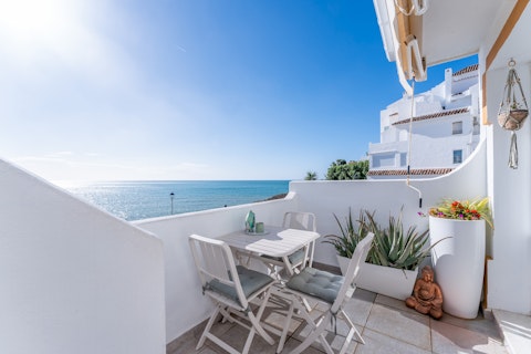 Dine above the water with the Mediterranean stretching ahead