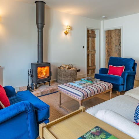 Unwind in front of the log burner after walking the Cotswold Way