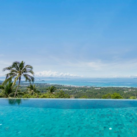 Soak up stunning sea views as you swim in the sunshine