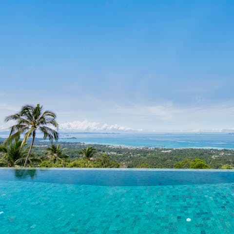 Soak up stunning sea views as you swim in the sunshine