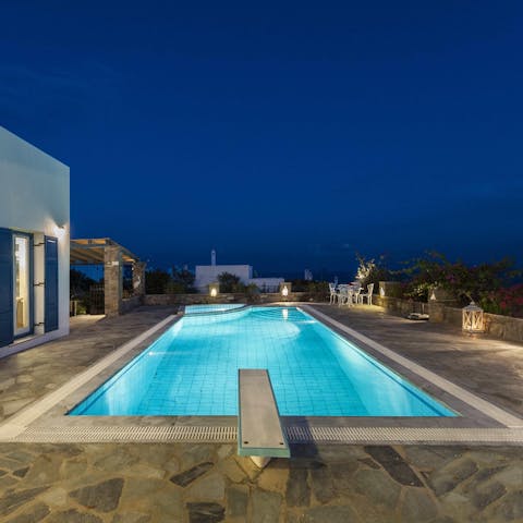 Take a refreshing dip in the sparkling swimming pool