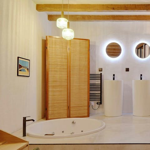 Soak in the jacuzzi tub after a day on your feet