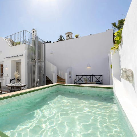 Take a refreshing dip in the rooftop pool