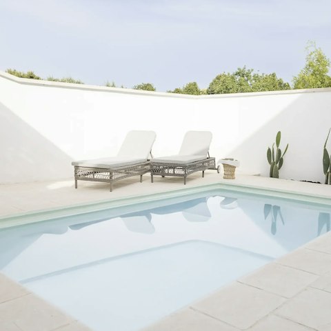Spend a day horizontal, lounging by the private pool