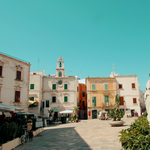 Explore the region's historic towns and lively piazzas