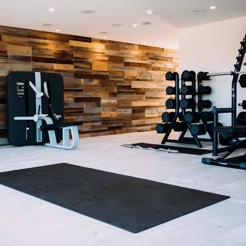 Stay on top of your fitness routine with a workout in the on-site gym