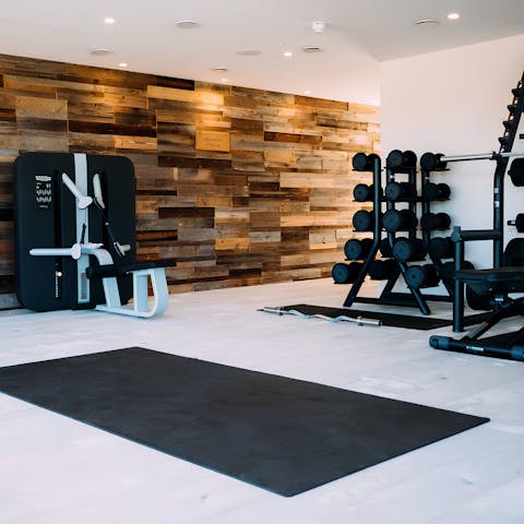Stay on top of your fitness routine with a workout in the on-site gym