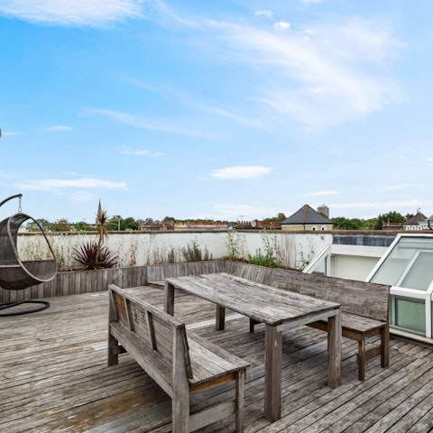 Watch the sun set over the city on your roof terrace
