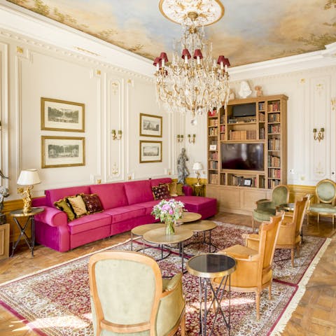 Admire opulent features like the chandeliers and Versailles flooring