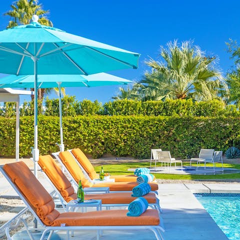 Laze on loungers in the sun by day and gather around the fire pit by night