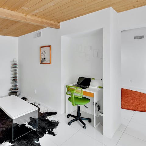 Catch up on a couple of emails at the dedicated desk area off the master bedroom