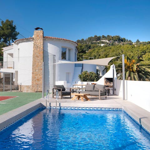 Relax out by the pool or indulge in a few games of tennis