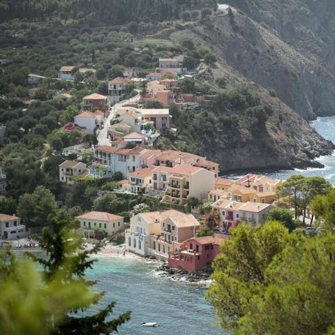 Take a five-minute stroll down to Assos' charming harbour and beach