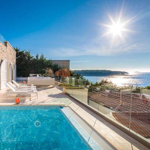 Soak up the sea view from the private pool