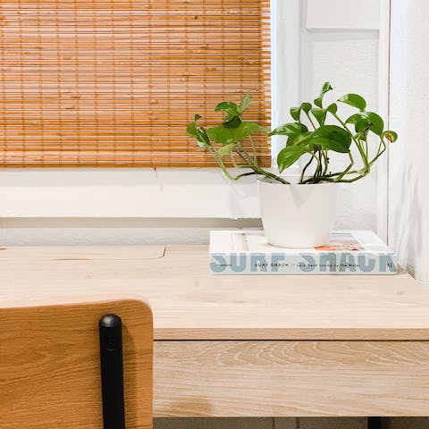 Catch up on work at the desk before a day of adventure