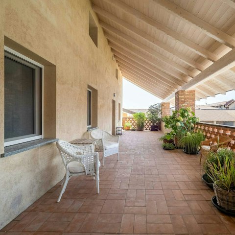 Sit out on the covered terrace with a cup of coffee
