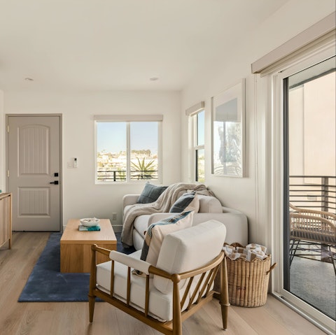 Gather in the bright living room after a day on the beach